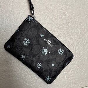 Coach Black Wristlet with Light Blue Snowflakes